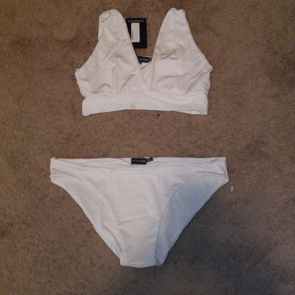 2 piece bathing suit. Still have original package
